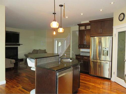 624 Tokar Road, Seven Persons, AB - Indoor Photo Showing Kitchen With Double Sink