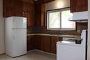 102 4 Avenue East, Bow Island, AB  - Indoor Photo Showing Kitchen With Double Sink 