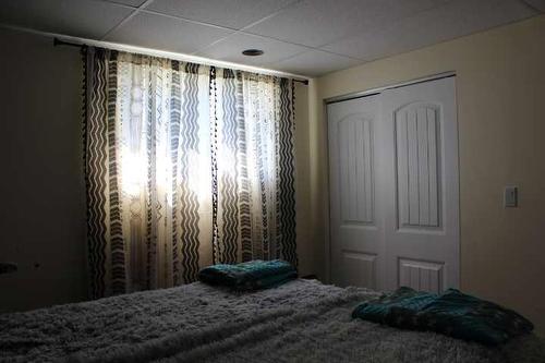 111017 Range Road 103 North, Bow Island, AB - Indoor Photo Showing Bedroom