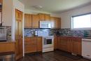 111017 Range Road 103 North, Bow Island, AB  - Indoor Photo Showing Kitchen 