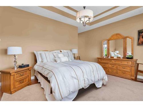 284 Desert Blume Drive, Desert Blume, AB - Indoor Photo Showing Bedroom