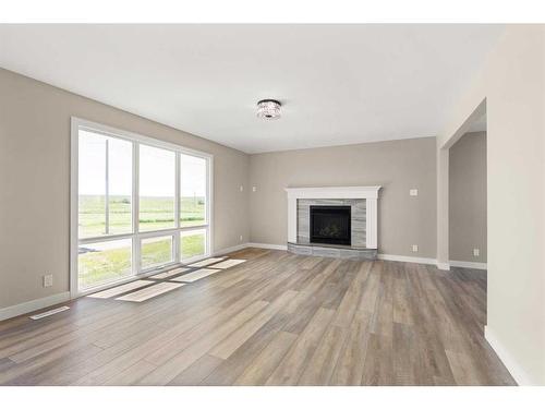 2-12301 Range Road 51A, Rural Cypress County, AB - Indoor Photo Showing Living Room With Fireplace