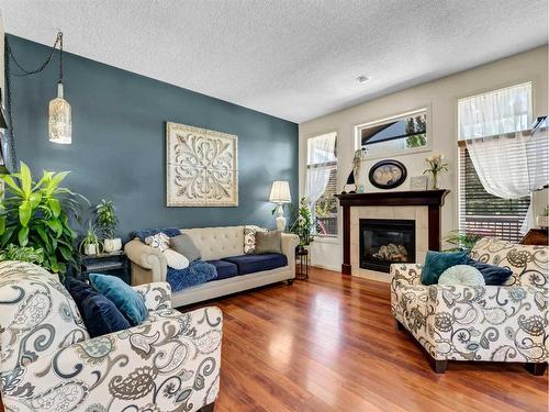 15 Somerset Place Se, Medicine Hat, AB - Indoor Photo Showing Living Room With Fireplace