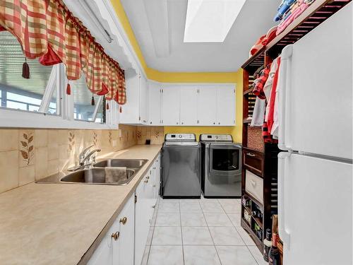 5106 Highway 41A, Rural Cypress County, AB - Indoor Photo Showing Kitchen With Double Sink