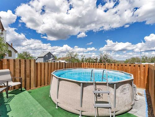 436 3 Street West, Empress, AB - Outdoor With Above Ground Pool