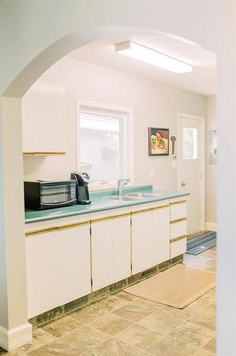 5823 50A Avenue, Stettler, AB - Indoor Photo Showing Kitchen With Double Sink