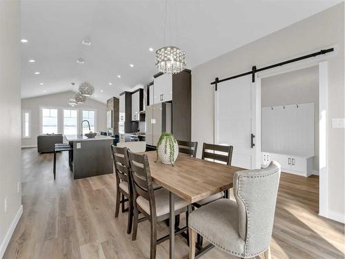 33 Dunes Way, Desert Blume, AB - Indoor Photo Showing Dining Room