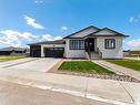 33 Dunes Way, Desert Blume, AB  - Outdoor With Facade 