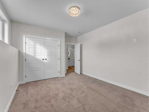 33 Dunes Way, Desert Blume, AB - Indoor Photo Showing Other Room