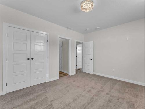 33 Dunes Way, Desert Blume, AB - Indoor Photo Showing Other Room