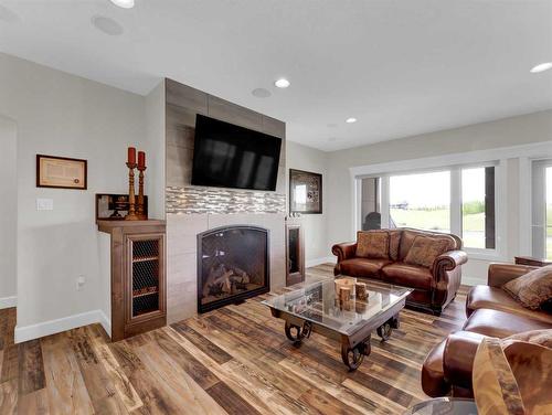 7-12331 Range Road 72, Rural Cypress County, AB - Indoor Photo Showing Living Room With Fireplace