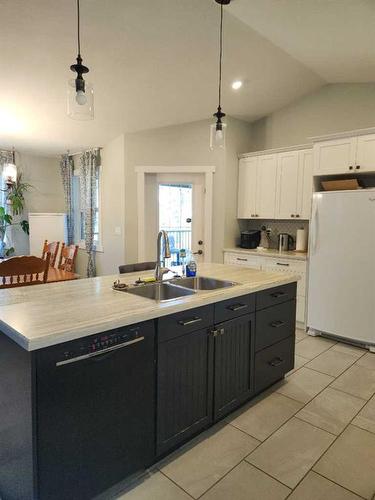 29305 Range Road 41, Oyen, AB - Indoor Photo Showing Kitchen With Double Sink