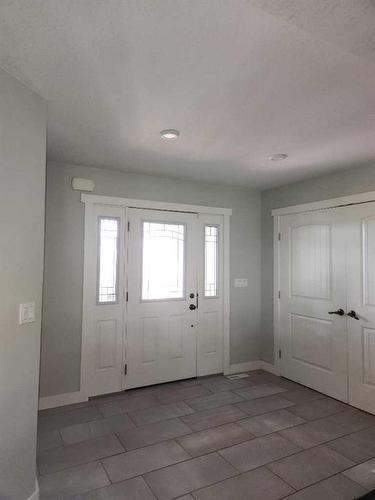 29305 Range Road 41, Oyen, AB - Indoor Photo Showing Living Room With Fireplace