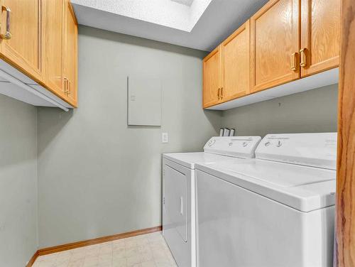 114-3021 13 Avenue Se, Medicine Hat, AB - Indoor Photo Showing Laundry Room