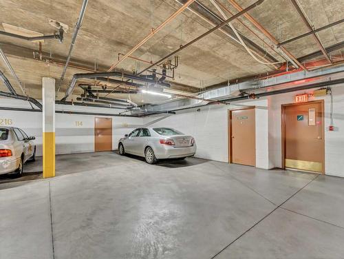 114-3021 13 Avenue Se, Medicine Hat, AB - Indoor Photo Showing Garage