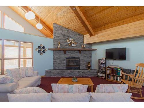 114-3021 13 Avenue Se, Medicine Hat, AB - Indoor Photo Showing Living Room With Fireplace