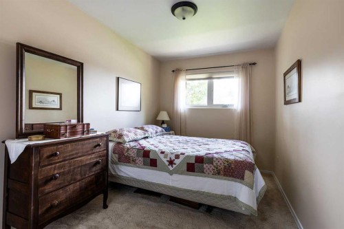 242 11Th Street Ne, Medicine Hat, AB - Indoor Photo Showing Bedroom