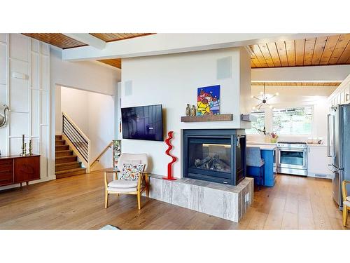 145 1 Street Sw, Medicine Hat, AB - Indoor Photo Showing Living Room With Fireplace