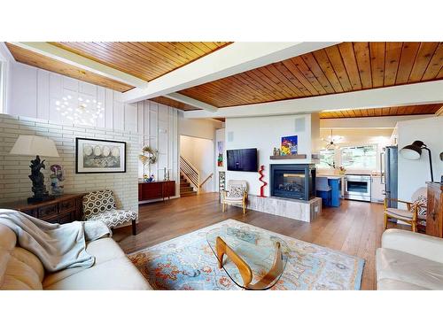 145 1 Street Sw, Medicine Hat, AB - Indoor Photo Showing Living Room With Fireplace