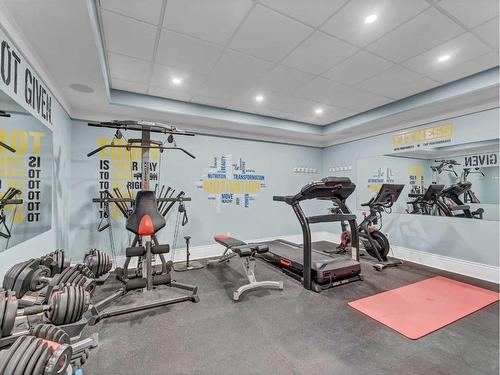 586 Somerside View Se, Medicine Hat, AB - Indoor Photo Showing Gym Room