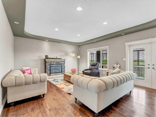 3 Desert Blume Gate, Desert Blume, AB - Indoor Photo Showing Living Room With Fireplace