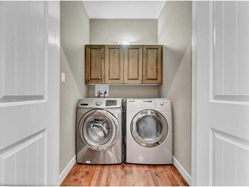 3 Desert Blume Gate, Desert Blume, AB - Indoor Photo Showing Laundry Room