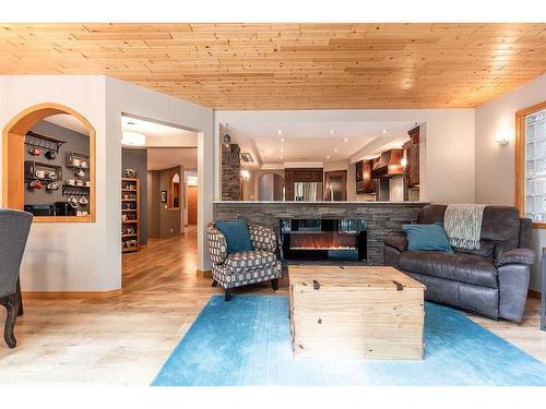 137 1 Street Nw, Medicine Hat, AB - Indoor Photo Showing Living Room With Fireplace