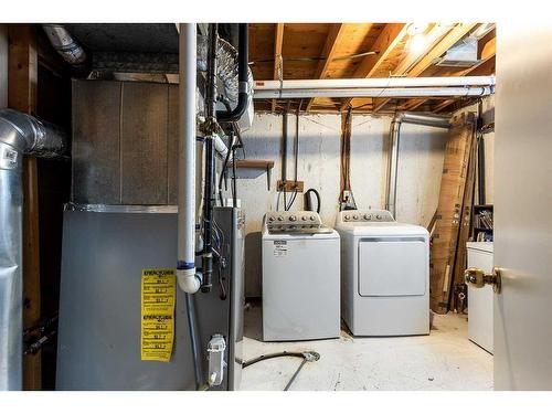 1918 17 Street Se, Medicine Hat, AB - Indoor Photo Showing Laundry Room