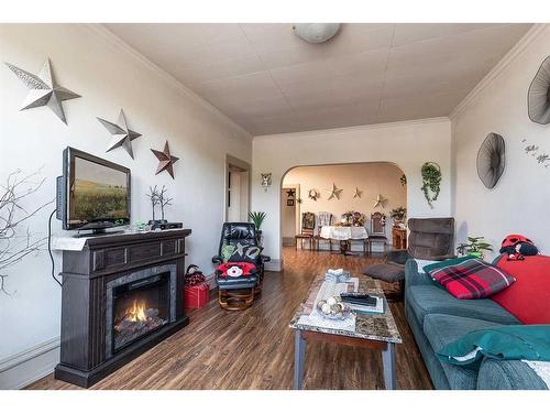 517A North Railway Street Se, Medicine Hat, AB - Indoor Photo Showing Living Room With Fireplace