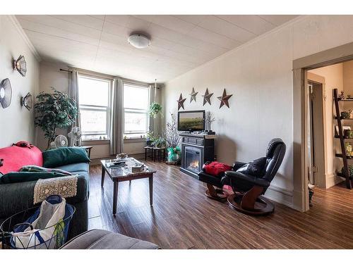 517A North Railway Street Se, Medicine Hat, AB - Indoor Photo Showing Living Room With Fireplace