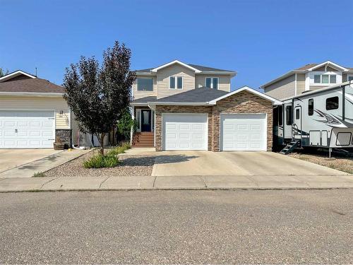 938 Manor Place, Redcliff, AB - Outdoor With Facade