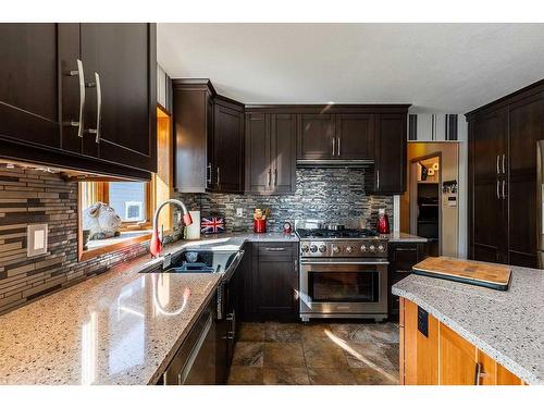 594 Ross Glen Drive Se, Medicine Hat, AB - Indoor Photo Showing Kitchen With Stainless Steel Kitchen With Double Sink With Upgraded Kitchen