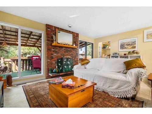 2628 12 Ave Se, Medicine Hat, AB - Indoor Photo Showing Living Room With Fireplace