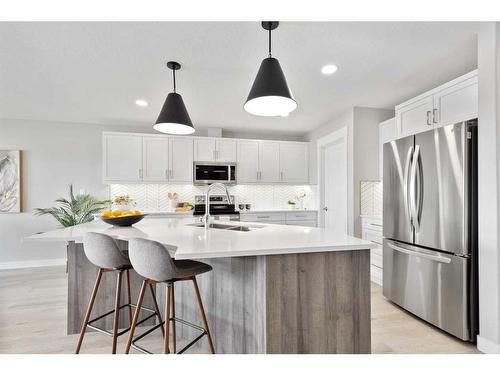 93 Ranchlands Boulevard Ne, Medicine Hat, AB - Indoor Photo Showing Kitchen With Stainless Steel Kitchen With Double Sink With Upgraded Kitchen