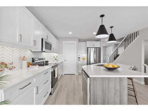 93 Ranchlands Boulevard Ne, Medicine Hat, AB - Indoor Photo Showing Kitchen With Stainless Steel Kitchen With Upgraded Kitchen