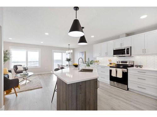 93 Ranchlands Boulevard Ne, Medicine Hat, AB - Indoor Photo Showing Kitchen With Double Sink With Upgraded Kitchen