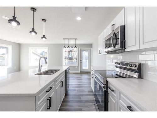 53 Somerside Gate Se, Medicine Hat, AB - Indoor Photo Showing Kitchen With Double Sink With Upgraded Kitchen