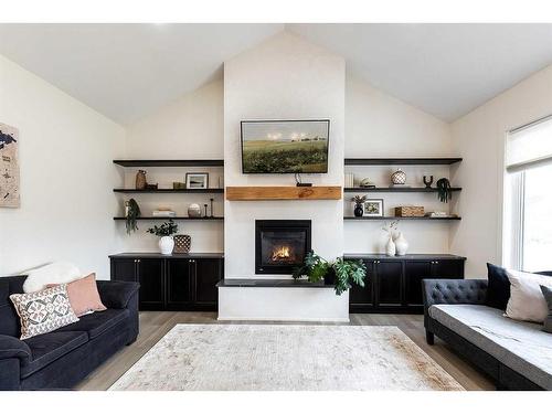 24 Heron Court Sw, Medicine Hat, AB - Indoor Photo Showing Living Room With Fireplace