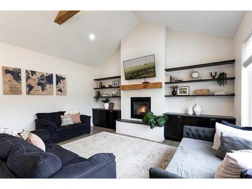 24 Heron Court Sw, Medicine Hat, AB - Indoor Photo Showing Living Room With Fireplace