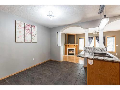 32 Stonegate Crescent Se, Medicine Hat, AB - Indoor With Fireplace