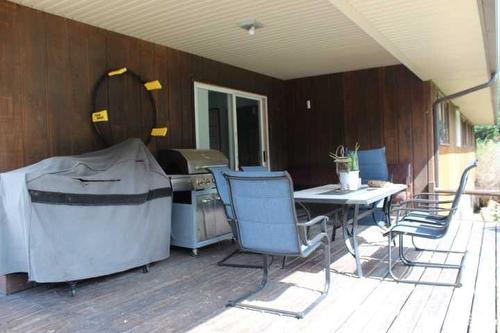 115054 103 Range Road North, Bow Island, AB - Outdoor With Deck Patio Veranda With Exterior