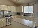 246 Stratton Way Se, Medicine Hat, AB  - Indoor Photo Showing Kitchen With Double Sink 