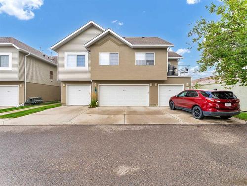 201-221 Cameron Road Se, Medicine Hat, AB - Outdoor With Facade