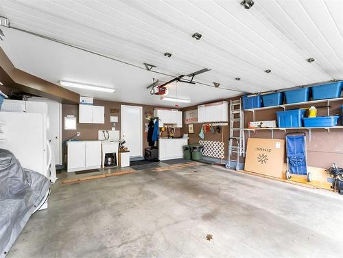 201-221 Cameron Road Se, Medicine Hat, AB - Indoor Photo Showing Garage