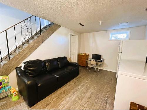 230 8 Avenue East, Bow Island, AB - Indoor Photo Showing Basement