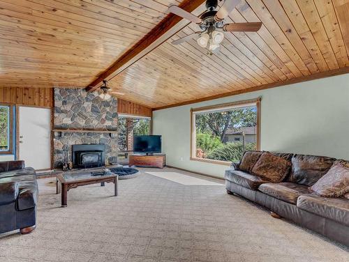 7306 Highway 523, Rural Cypress County, AB - Indoor Photo Showing Living Room With Fireplace