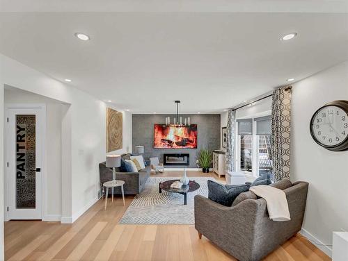 90 Taylor Crescent Se, Medicine Hat, AB - Indoor Photo Showing Living Room With Fireplace