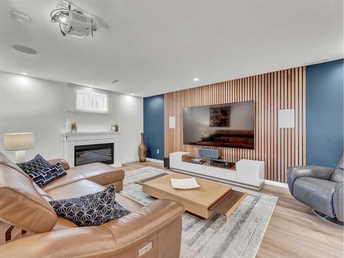 90 Taylor Crescent Se, Medicine Hat, AB - Indoor Photo Showing Living Room With Fireplace