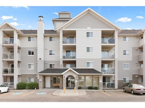 302-1632 Saamis Drive Nw, Medicine Hat, AB - Outdoor With Balcony With Facade