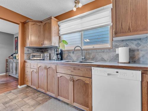 759 17 Street Ne, Medicine Hat, AB - Indoor Photo Showing Kitchen With Double Sink